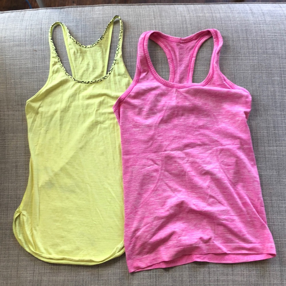 Two Lululemon women’s singlets